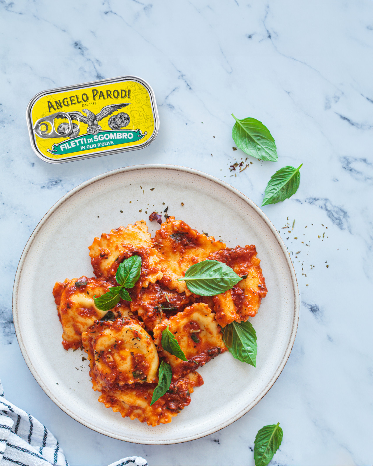 Ravioli ripieni di Filetti di Sgombro in Olio d'Oliva Angelo Parodi al sugo di pomodori Pachino