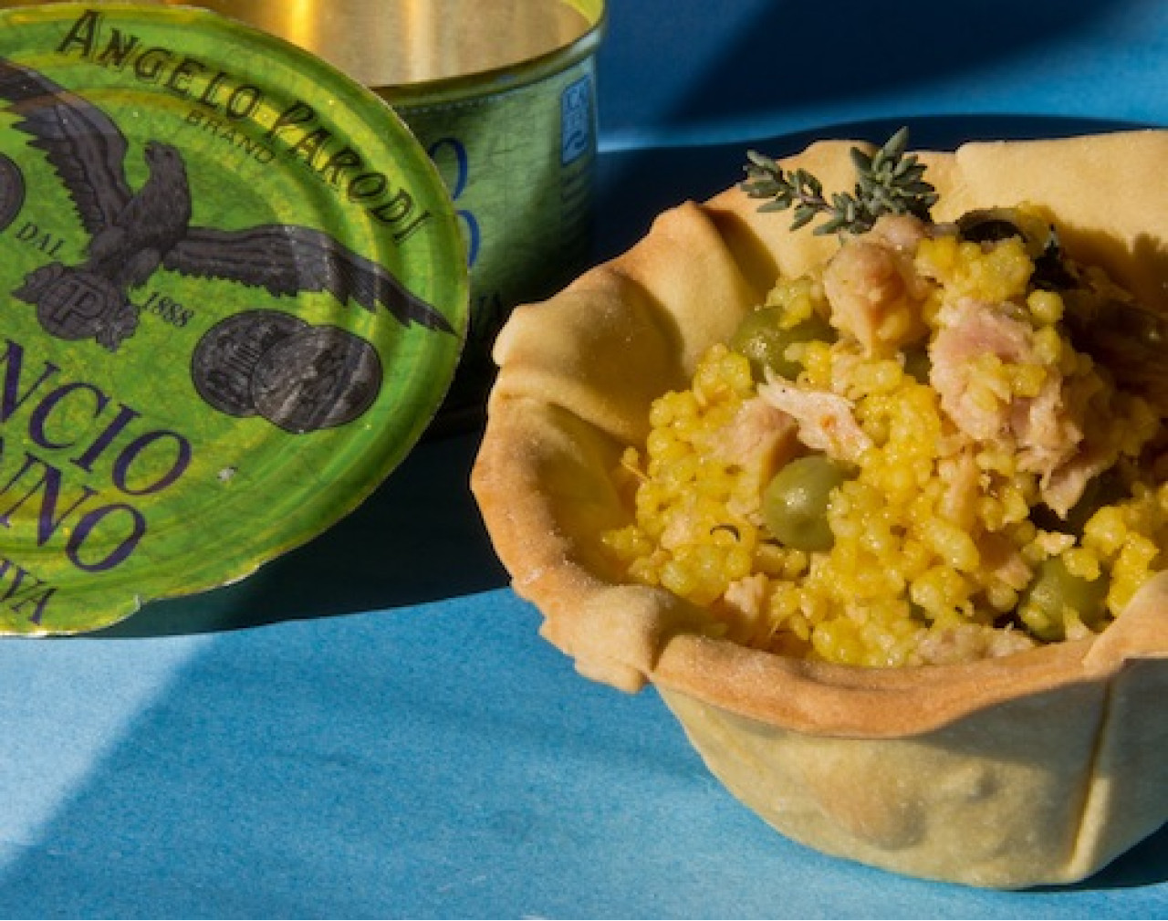 Cous cous speziato con Filetti di Tonno in Olio d'Oliva Angelo Parodi e piselli 